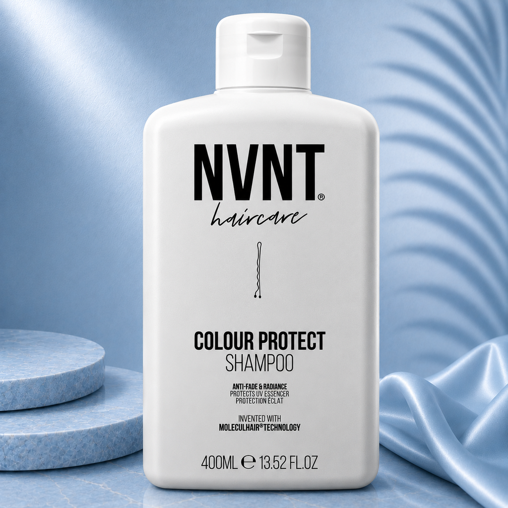 Blue 400ml NVNT Colour Defence Shampoo Ritual by Ds Hair By Dalia, showcasing the sleek bottle and vibrant label.