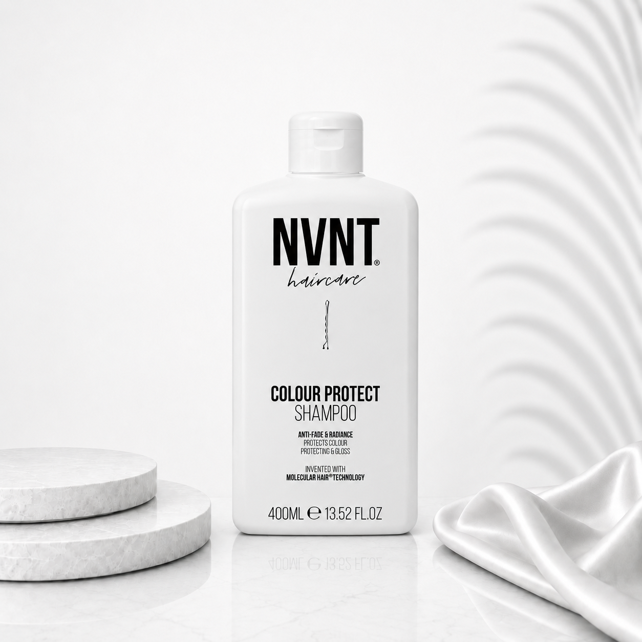 NVNT Ds Hair By Dalia Colour Defence Shampoo Ritual in 400ml bottle, with a sleek label and vibrant color protection design.