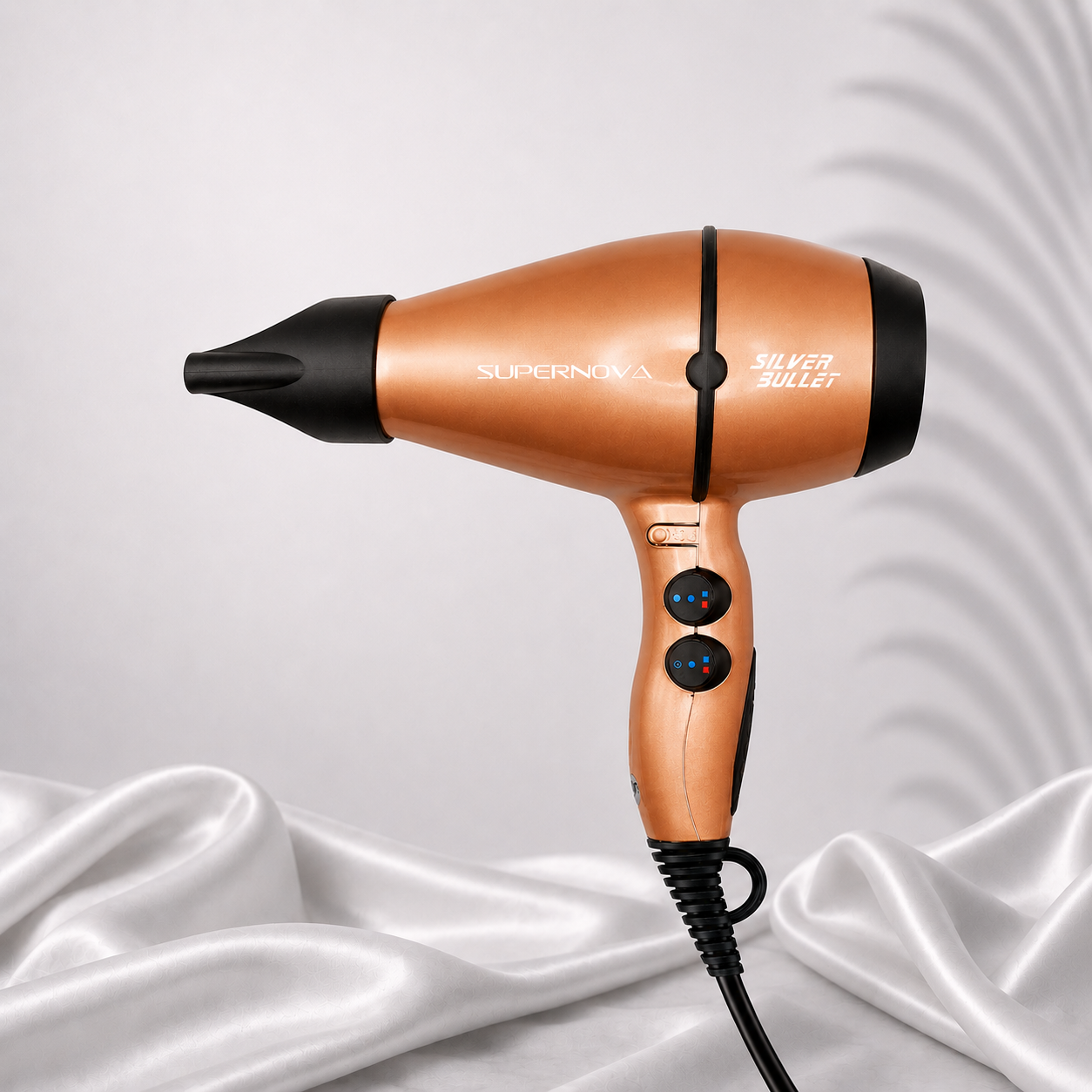 Silver Bullet Supernova Hair Dryer by Ds Hair By Dalia, champagne-colored professional hair dryer with sleek design.