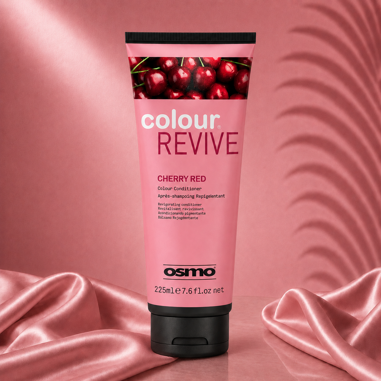 Osmo by Ds Hair Dalia Colour Revive Mask Ritual in cherry red, showing vibrant, glossy hair treatment in a sleek jar.